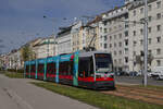 B 658 auf der Linie 18 vor der Haltestelle Heinrich-Drimmel-Platz, 12.04.2023