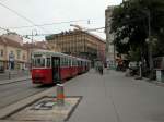 Wien Wiener Linien SL 49 (c3 1212 (Lohnerwerke 1961)) VII, Neubau, Burggasse / Volkstheater am 5. August 2010.