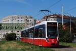 Tw.320 als Linie 6 zur Geiereckstraße kurz vor der Haltestelle Magarethengürtel.