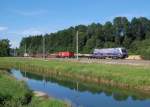 Der Sheriff-Ochse 1116 250 ist am 16.07.2011  mit dem 54695 in Wartberg an der Krems durchgefahren.