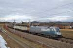 Mit dem "Wenzelzug" 43931 hat die 1116 038 am 15.01.2011  den Haidinger Bogen in der Ortschaft Katzbach durchfahren.