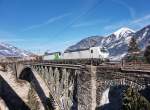 SETG 193 240-9 + SETG 193 821 mit dem "Slurryzug" unterwegs in Richtung Jesenice, am 12.2.2016 auf der Angerschluchtbrücke.
