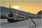 Die Sonne war schon hinter der Planai verschwunden, als Werbelok 1116 264 "Hitradio �3" mit dem Schi WM Sonderzug SR 9325 von Schladming nach Graz Hbf fuhr.