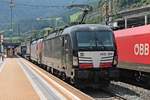 Am Morgen des 03.07.2018 fuhr MRCE/TXL X4 E-670 (193 670-7) zusammen mit MRCE/TXL X4 E-640 (193 640-0) "CONNECTED BY RAIL" und einem "LKW WAlter"-KLV durch den Bahnhof von Matrei am Brenner in