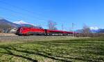 1116 235 mit dem RJX 662 nach Bregenz am 08.03.2025 bei Hall in Tirol.