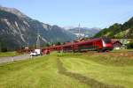 Serie Arlbergbahn : ein RailJet am Bahn�bergang bei Braz, im 3,1% Gef�lle kurz vor Bludenz - 28.6.2012
