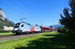 1116 233 mit dem RJX 869 nach Flughafen Wien am 06.09.2025 bei Kematen in Tirol.