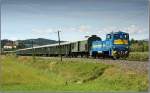 Diesellok 383.10 der NBiK f�hrt mit Sonderzug 19815 von St.Paul nach Lavam�nd und wieder retour.Im Hintergrund ist das Benediktinerstift zu sehen.