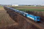 1016 023 "Kyoto" ist mit einem Gefco Autoganzzug in Richtung Gramatneusield unterwegs.