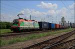 SOS Kinderdorf 1116.007 fuhr am 23.07.14 mit einem Containerzug durch Gramatneusiedl Ri.