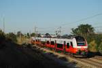4746 024 als S1 29779 zwischen Helmahof und Deutsch Wagram auf der Fahrt nach Wien - Meidling.