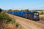 1116 126 "Licht ins Dunkel Sterneaktion", unterwegs mit einem PKP Cargo Ganzzug kurz nach Helmahof in Richtung Deutsch Wagram.
