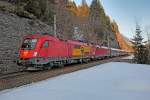 1116 065, 1116 xxx fahren abends den 13.3.2015 mit dem EC aus Graz nach Zürich HB talwärts den Arlberg hinunter.Bild aus Wald am Arlberg