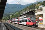 Einfahrt am Morgen des 03.07.2018 von ÖBB 4024 094-7 zusammen mit ÖBB 4024 025-1 als REX (Brenner/Brennero - Innsbruck Hbf/Wörgl Hbf) in den Bahnhof von Mattrei am Brenner ein.