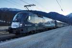 1116 248-6 "The Red Bulletin Fashion Train" als railjet 632 (Lienz - Wien Hbf) am 19.1.2016 beim Halt in Greifenburg-Weißensee.