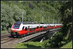 Cityjet 4744 566 fährt am 8.05.2018 üer die Murbrücke bei Peggau.