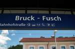 Bahnhofsschild von Bruck-Fusch am 8.7.2012