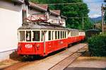 11.07.1999 in Attersee, ein Zug der von der Fa. Stern & Hafferl betriebenen Atterseebahn. Vorn ET 26 110. Soll sich jetzt beim Verein Sernftalbahn befinden.