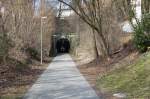 Spurensuche bei der BWB.(1902-1983)Ausser dem ehem.Lokschuppen,gibt es in Bregenz-Vorkloster nur noch den 212m langen Riedentunnel.Im Bild das Tunnelportal und das ehem.Trassee auf Bezauer Seite,heute ein Velo und Wanderweg.12.03.11 

