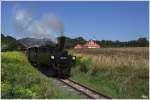 Dampflok 699 101 Dh2t Franco-Belge Bj 1944 fhrt auf der Gurkthalbahn von Pckstein Zwischenwssern nach Treibach Althofen, hier bei der Ausfahrt in Pckstein-Zwischenwssern mit dem Schlo Pckstein im Hintergrund.
5.8.2012