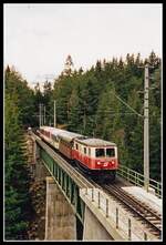 1099 016 mit R6809 auf der Kuhgrabenbrücke am 10.04.2001.