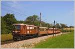 1099.010 mit dem Dampfsonderzug R 19259 auf der Fahrt von St. Plten Hbf nach Mariazell. In Ober Grafendorf kam dann die 1099.010 vom Zug und es wurde auf Mh.6 (Dampf-Tfz 399.06) umgespannt. Nadelbach; 4. Juli 2010