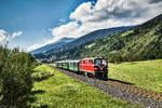 Vs 72 fährt mit dem Sdz 3391 (Krimml - Zell am See), kurz vor der Haltestelle Vorstadl vorüber.
Aufgenommen am 8.9.2018.