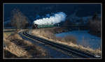 Mit den letzten Sonnenstrahlen des 29.12.2016, dampft JZ 73-019 der Pinzgaubahn mit dem Wintermärchendampfzug 3394 von Zell am See nach Krimml.