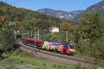 ÖAMTC 1116.153 fährt mit RJ-559 bei herrlichster Herbststimmung durch Küb.