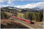 RJ 533  powered by Lakeside Park  von Wien nach Villach am 25.2.2012 zwischen Steinbauer-Tunnel und dem Bahnhof Eichberg auf der Semmering Nordrampe aufgenommen. 
