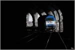 Tunnelblick II - Vorbei an der Weinzettelwand Galerie, zieht die Adria Transport Diesellok 2016 920, einen Leerzug bergwrts Richtung Semmering. Das Bild entstand mittels Teleobjektiv, auerhalb des Tunnels. 
Breitenstein 10.3.2012