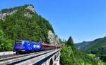 1116 154 mit dem RJ 110 nach München Hbf via Graz - Klagenfurt - Salzburg am 27.06.2026 bei Breitenstein am Semmering.