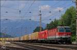 1144.021 und 1116.127 durchfahren am 27.07.13 mit einem Innofreight Ganzzug den Bhf.