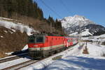 1144 116 war am 15. Februar 2023 bei Pfaffenschwend schiebend in Richtung Zell am See im Einsatz.