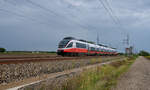 Die Marchegger Ostbahn hat ihr Erscheinungsbild in den letzten Jahren stark verändert und ist heute wieder ein internationaler Korridor, der Wien und Bratislava verbindet. 4024 021 war am 12.09.2025 als R2565 von Marchegg nach Wien Hbf. unterwegs. Gerade wurde der neu gebaute Haltepunkt Untersiebenbrunn verlassen.