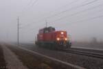 Am Morgen des 18.12.2025 kämpft sich die 2068 058 von Bruck an der Mur nach Wien Zvb durch den dichten Nebel hier kurz vor Wiener Neustadt.