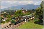 664 119 mit ihrem SE 19194 bei der Durchfahrt der Haltestelle St.Paul im Lavanttal - Bad am 25.6.2010. Es ist nur eine Frage der Zeit, und der Blick auf das Stift St. Paul im Lavanttal ist Vergangenheit.