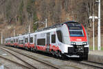 ÖBB 4748 035 ff mit Werbung für die Europaregion Tirol - Südtirol - Trentino auf einer Betriebsfahrt, Werfen, 08.03.2024