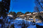 RTS 1216 902 überquert mit dem GAG 41833, auf der Fahrt in Richtung Kärnten, den Hundsdorfer-Viadukt bei Bad Hofgastein.
Aufgenommen am 15.2.2017.