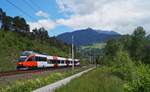 Am 17.05.2020 war der 4024 032-7 mit der Zugleistung des coronabedingt nur bis Steinach in Tirol geführten REX 5220 bei Terfens auf dem Weg in Richtung Innsbruck.