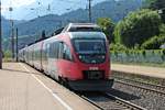 Einfahrt am 02.07.2018 von ÖBB 4024 075-6 als REX nach Hochfilzen zusammen mit ÖBB 4024 059-0 als REX nach Wörgl Hbf in den Bahnhof von Fritzens-Wattens.