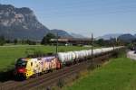 Die ÖBB-ÖAMTC Lok 1116 153-8 ist am 17.9.2014 mit einem Kesselzug von GATX durch Tirol unterwegs. Hier zwischen Kirchbichl und Wörgl. In Wörgl wird die Lok umgesetzt und Fährt über die Gisela-Bahn (Kitzbühel) nach Schwarzach St.Veit.