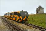 NSBB Salamander Triebwagen  Leo  13+23+33+Baby3 fhrt von Bahnhof Hochschneeberg nach Puchberg am Schneeberg.Im Hintergrund sieht man die Elisabethkirche, sie wurde im Auftrag von Kaiser Franz Joseph