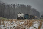 Auf dem Weg nach Wies Eibiswald donnert DH 1700.2 mit Ihrem Güterzug bei Hohlbach durch die leich verschneite Süd-Weststeiermark.