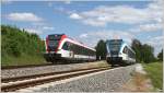 GKB GTW 63.08  S-Bahn Steiermark  fhrt als Sonderzug auf der Sulmtalbahn von Wies-Eibiswald nach Gleinsttten und retour, hier bei Paralleleinfahrt mit GTW 63.10 als R 8535 (Graz Hbf - Wies Eibiswald), nahe Gasselsdorf.
17.5.2012