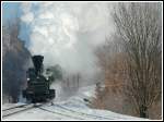 GKB 671 mit ihrem Dampfsonderzug R 8515 von Graz nach Wies-Eibiswald am 5.2.2006, aufgenommen kurz vor dem Bahnhof Lannach. 