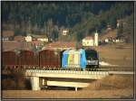 Diesellok 2016 903 European Bulls der Firma LTE fhrt mit einem Leergterzug von Pls nach Knittelfeld.Im Hintergrund ist die Kirche von Sillweg zu sehen.
Aichdorf 7.2.2008