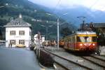 Mit dem abendlichen Zug nach Bludenz verläßt der ET 10.101 der Montafonerbahn (ex Bad Eilsener Kleinbahn) im August 1982 den Bahnhof Schruns