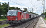 ÖBB-Produktion GmbH, Wien [A] mit der Vectron  1293 002  [NVR-Nummer: 91 81 1293 002-2 A-OBB] und einem Getreidezug am 06.07.23 Höhe Bahnhof Dedensen-Gümmer.