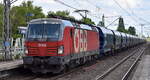 ÖBB-Produktion GmbH, Wien [A] mi ihrer  1293 199  [NVR-Nummer: 91 81 1293 199-6 A-ÖBB] und einem Getreidezug Richtung Norden am 23.05.24 Durchfahrt Bahnhof Berlin-Hohenschönhausen.